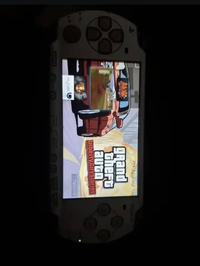 psp2000 jailbreak with 3 games and charger and sd card and battery