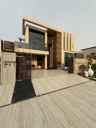 One Kanal Brand New Luxury Ultra-Modern Design Most Beautiful Fully Furnished Bungalow 2 Servant Quarter In Basement For Sale At Prime Location Of DHA Lahore Near To Park Masjid & Commercial Market.