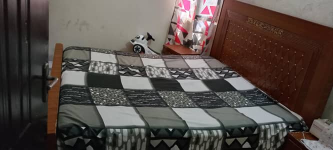 bed and dressing with 2 side tables