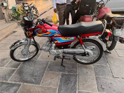 Honda CD 70, 2025 model, sticker 2026, ALMOST brand new.
