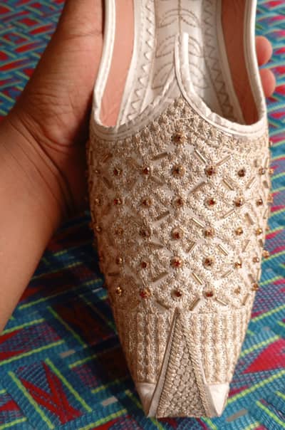 Handmade tilla work bridal khussa.