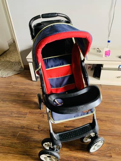 junior brand imported pram/ stroller with smooth tyer