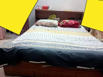 urgent wooden bed for sale