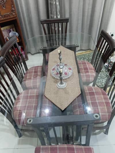 wooden dining table with 6 chairs