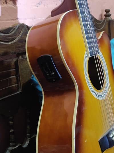 cutaway acoustic guitar xTps-100 6 month used-like new