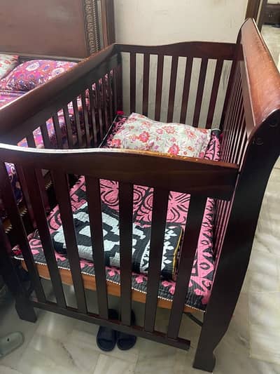 pure wooden babys crib/cot