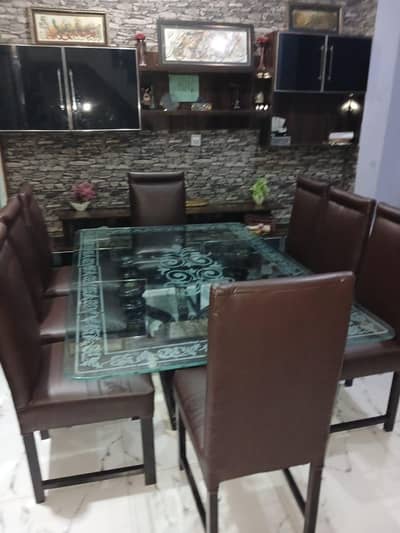 full wooden dining table with 8 chairs