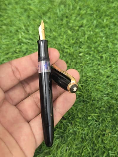 vintage Osmia piston-fill fountain pen.