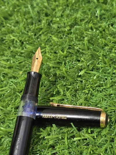 vintage Osmia piston-fill fountain pen.