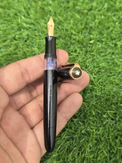 vintage Osmia piston-fill fountain pen.