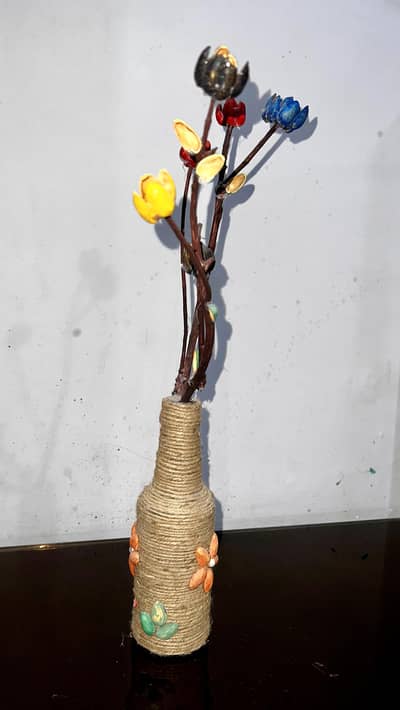 Homemade jute decorative bottle