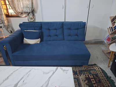 slightly used, almost new 7 seater sofa with center table and tv stand