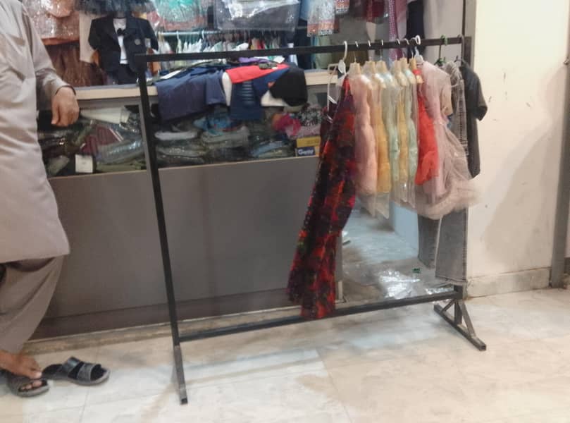 . 2 clothes stand for shop 0