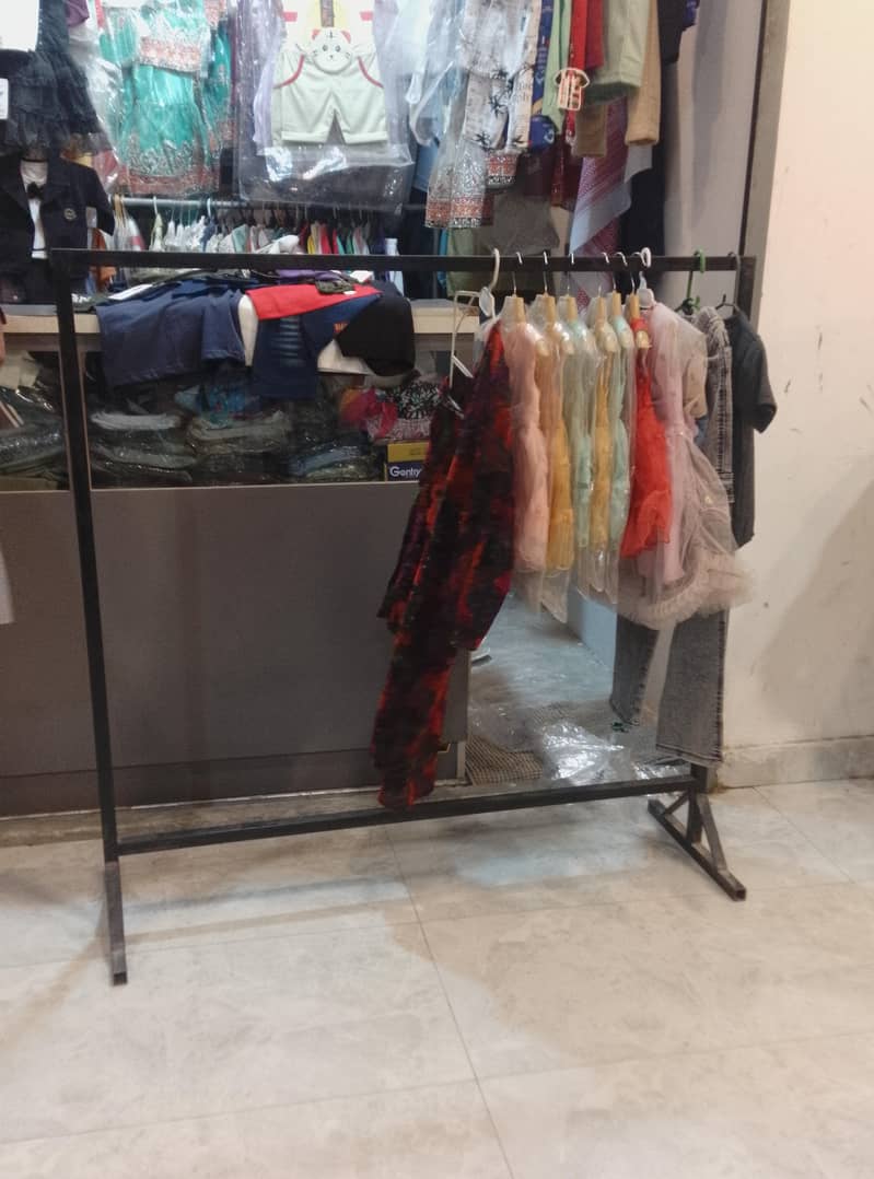 . 2 clothes stand for shop 1