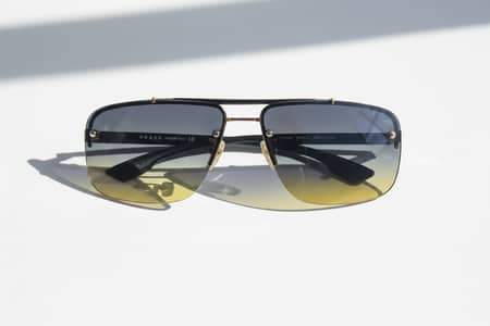 Prada Aviator Sunglasses – Gold Frame & Dark Gradient Lenses