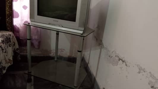 Samsung Tv with tv stand available for sale