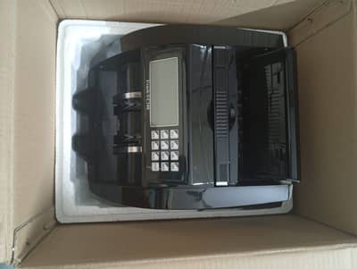 CASH COUNTING MACHINE WITH FAKE NOTE DETECTION