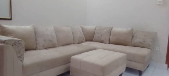 L shape sofa in half white colour