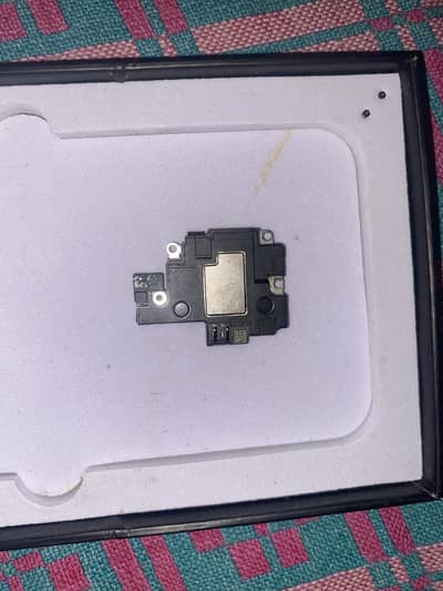 iPhone 11 speaker (bottom)