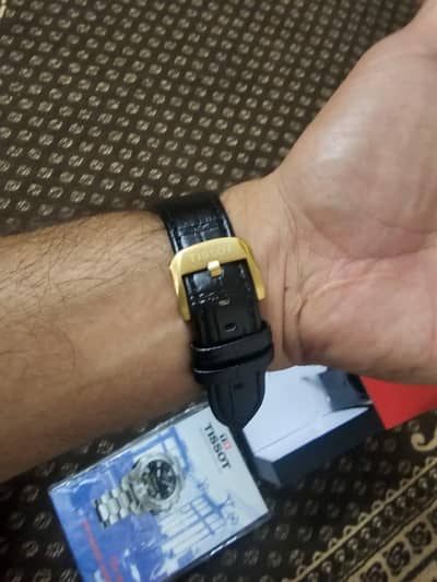 Tissot strap watch