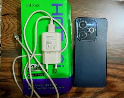 Infinix Hot 40i - 128 storage + 16gb(8+8)Ram - Box & Charger included