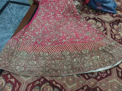 Bridal Lehnga with hand bag one time used for Sale