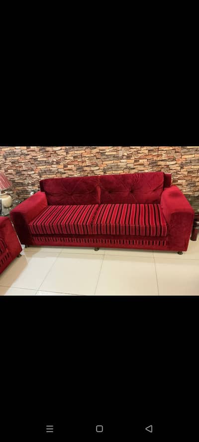 seven seater maroon velvety sofa set