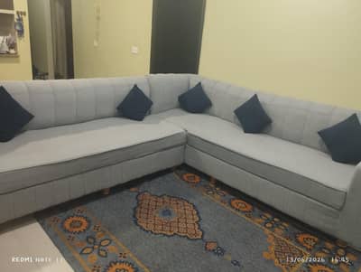 New 7 seater L shape sofa with covers and cushions