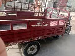 loader rickshaw  red colour
