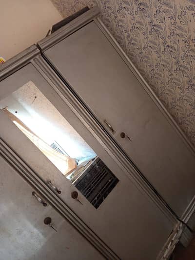 three doors iron cupboard