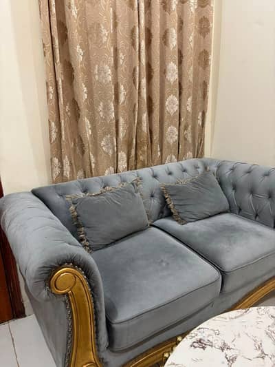 This sofa is a Chesterfield-style design