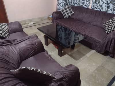 5 seater sofa with cover and glass table