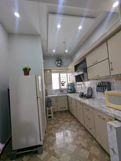 I RENT OUT A 5 MARLA HOUSE. IN BAHRIA ORCHARD LAHORE