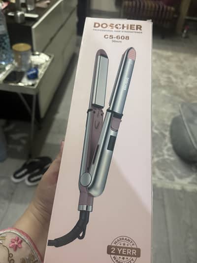 Selling unused branded hair ironing machine