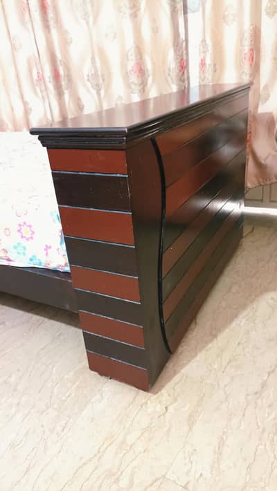 very good condition wooden bed