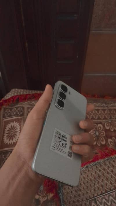 infinix Hot 60i. . . . new phone hay 6. . ya7. manch warranty hay abe