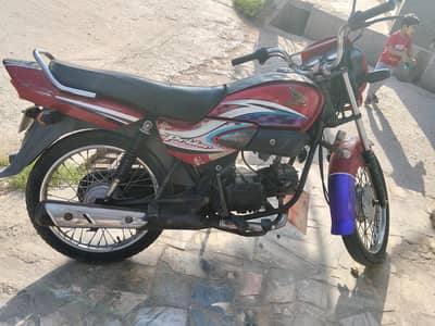Honda 100 2015 03219599697