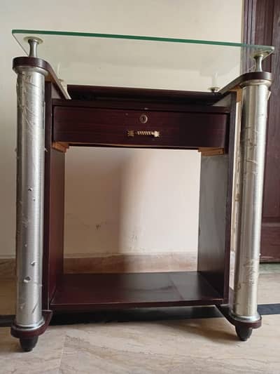 Wooden Table with mirror top and storage drawer.