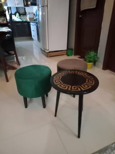 2 puffy stools and coffee table