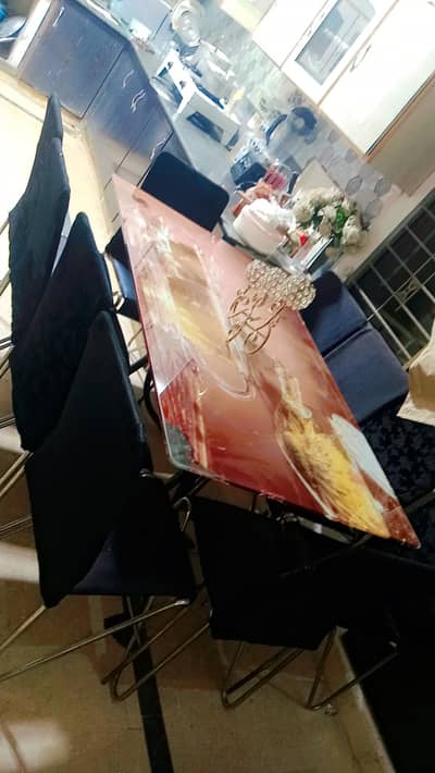 Dining table with 10 Chairs. , With too much Heavy Glass