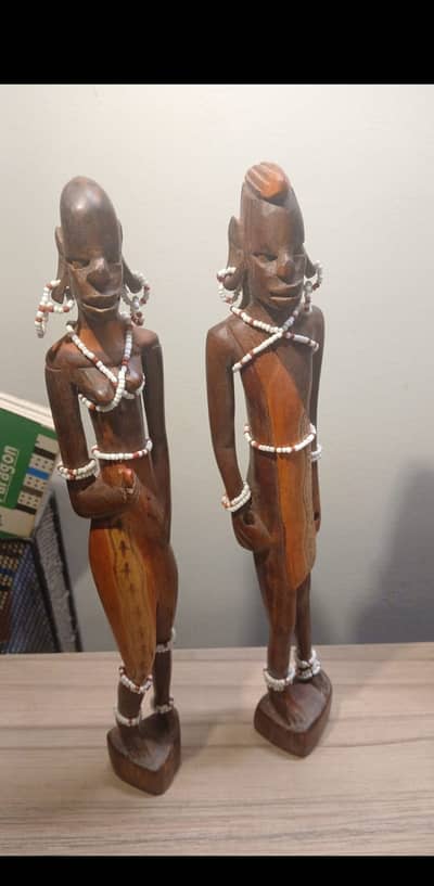 African Maasai couple figurines featuring intricuate detailed carving