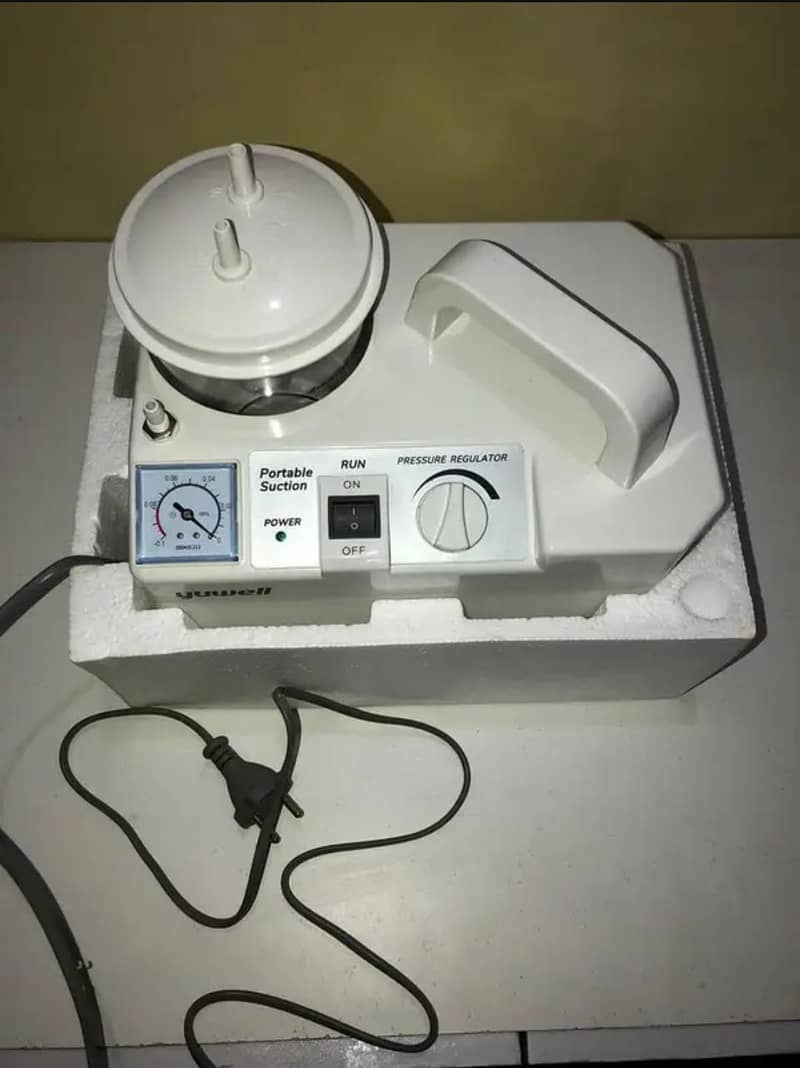 Suctioning machine 1