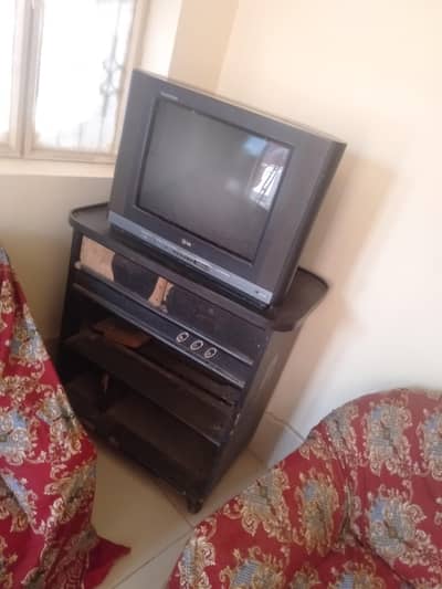 lg TV with trolley for sale in muzaffar garh