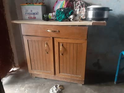 pressing table with drawer and cabinets