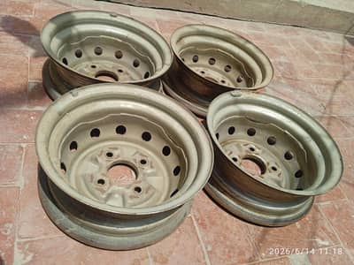 daihatsu coure 2007 model steel rim