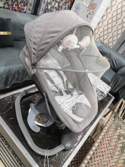 Electric Swing for kids with music bilkul brand new condition main ha