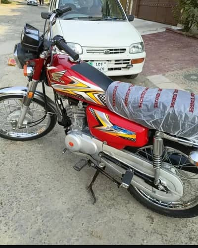 Honda 125 Red One hand use bilkul new fresh Mode 2024/25
