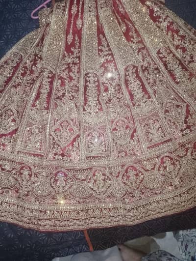 red bridal lehenga with choli, jewelry also available