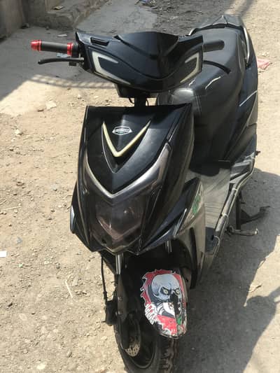 YG Future scooty 1 time charge 55-60 km drive