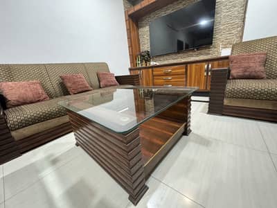 Seven seater sofa set with centre table and cusions